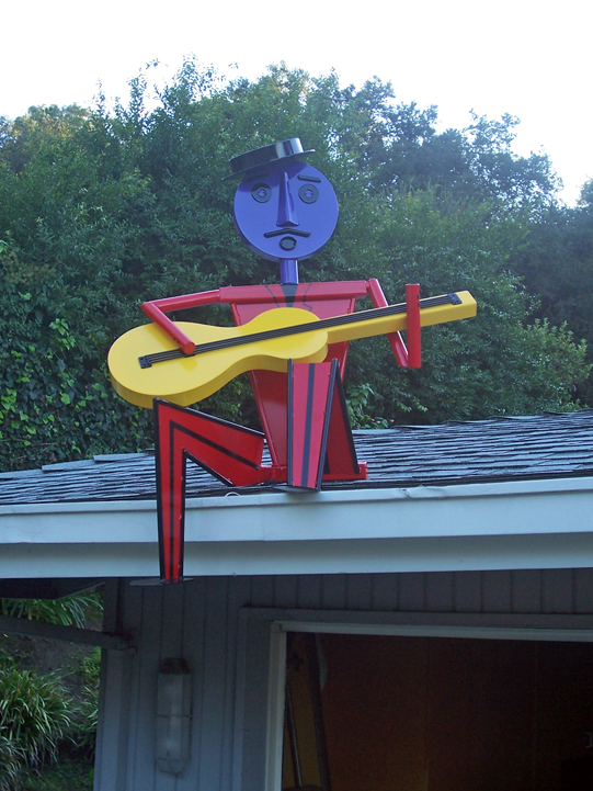 whimsical, colorful, abstract figurative, outdoor, sculpture, musician, guitarist, steel, enamel paints
